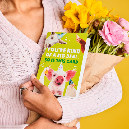 Oxfam Unwrapped card and flowers. Photo: Michelle Jarni Oxfam Unwrapped card and flowers. Photo: Michelle Jarni
