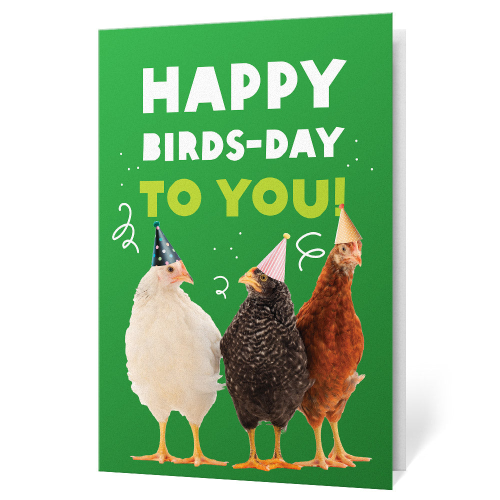 Birthday card with three chickens wearing party hats on a green background