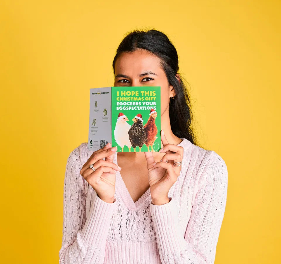 Australia: Safia holds up an Oxfam Unwrapped card. Photo: Michelle Jarni